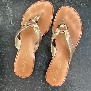 Lilly Pulitzer Gold Leather thongs in Size 6, rubber comfy sole lightly worn